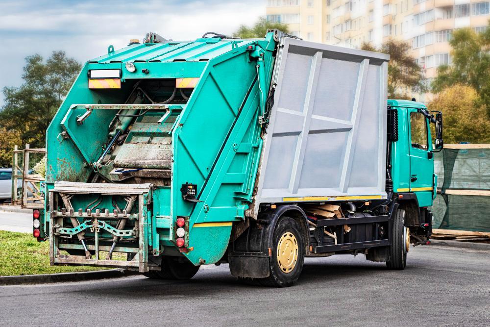 garbage-truck-picks-up-garbage-residential-area-separate-collection-disposal-garbage-garbage-collection-vehicle (1)